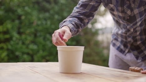 painting a wooden outdoor table