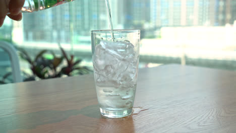 pouring-water-in-iced-glass