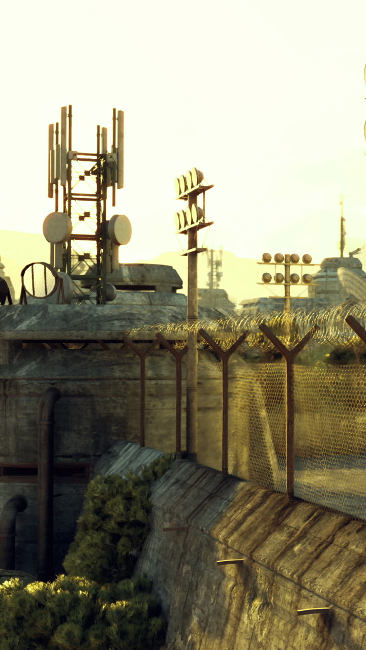 Rooftop view of an industrial landscape at sunset with communication towers