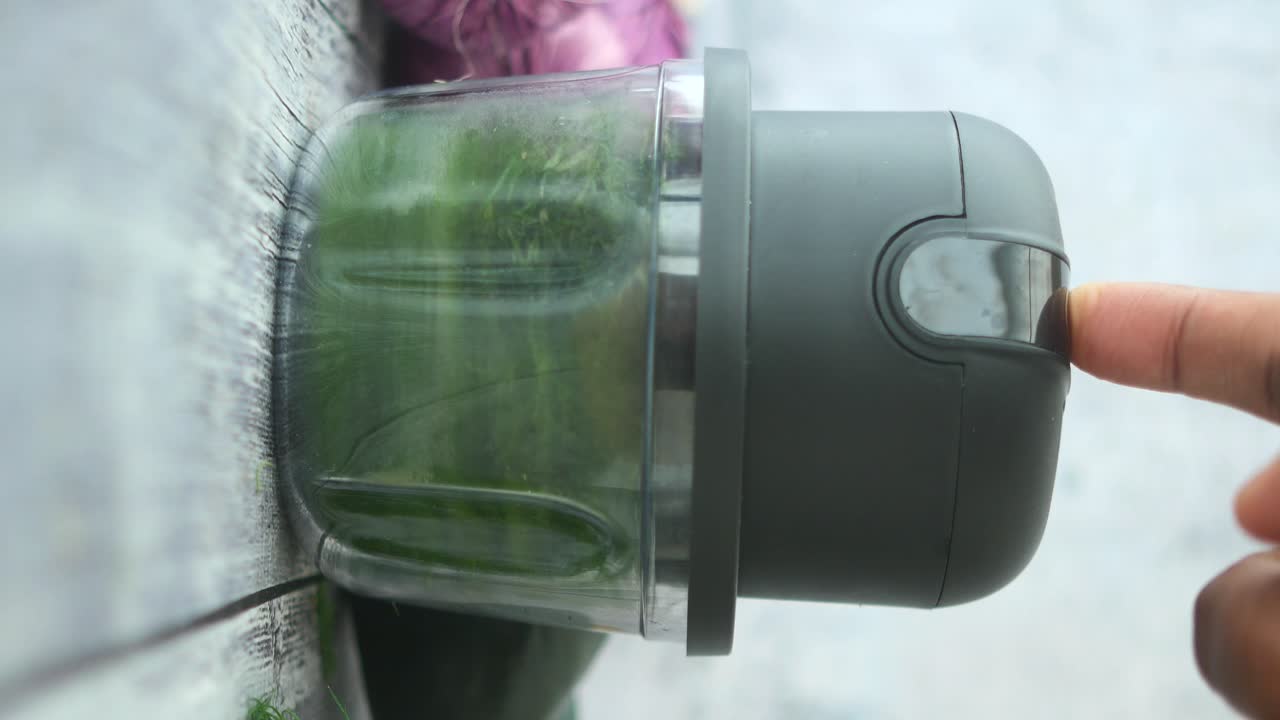 Close-up of a garlic chopper