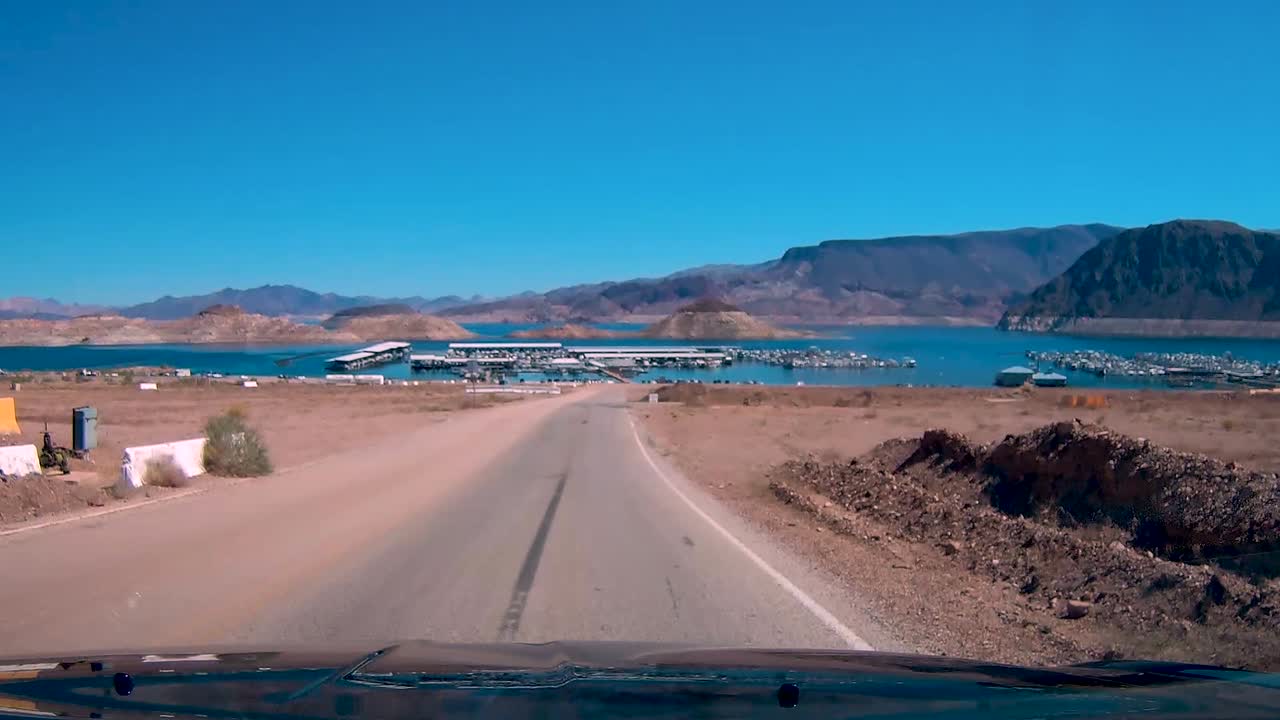 Approaching Lake Mead by car on a clear sunny day.