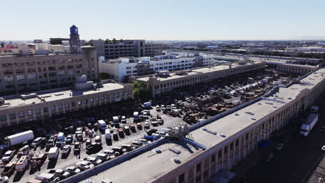 aerial view of a bustling outdoor market and urban landscape