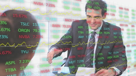 discussing stock market data and financial graphs, business professionals in meeting room