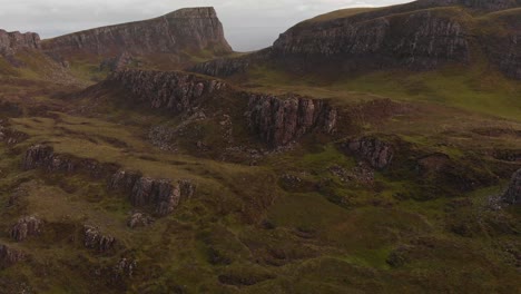 drone shot of quiraing landscape mountains and hills in isle of skye scotland