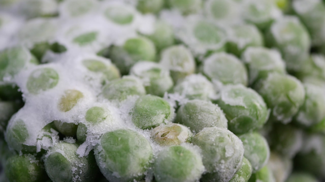 Close-up of Frozen Green Peas with Frost