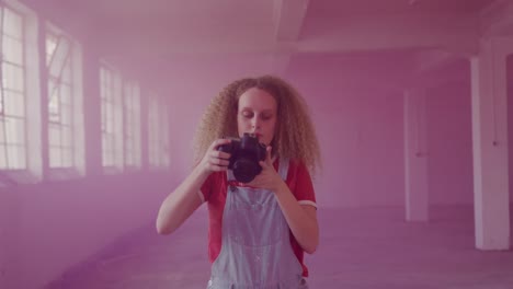 fashionable young woman in an abandoned warehouse