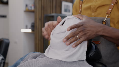 Barber Shaving a Customer's Face