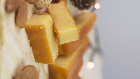 vertical shot of delicious yema tostada turron served in a plate, a southern european nougat confection