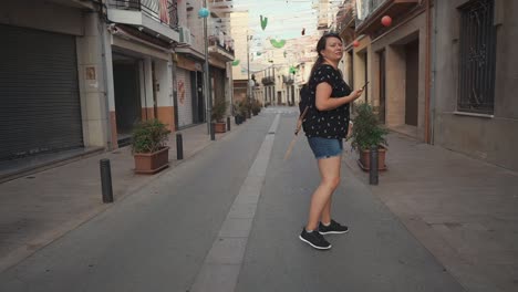 woman walking down a city street