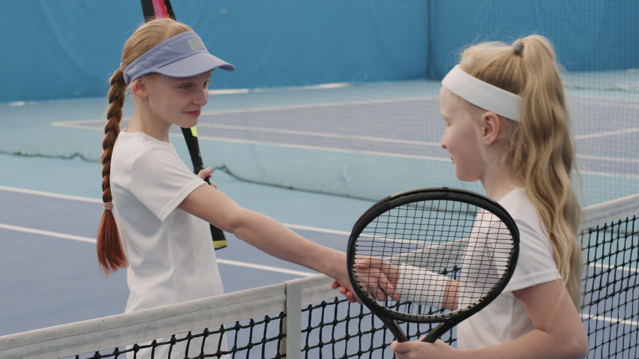 Little Girls Shaking Hands Before Tennis Game
