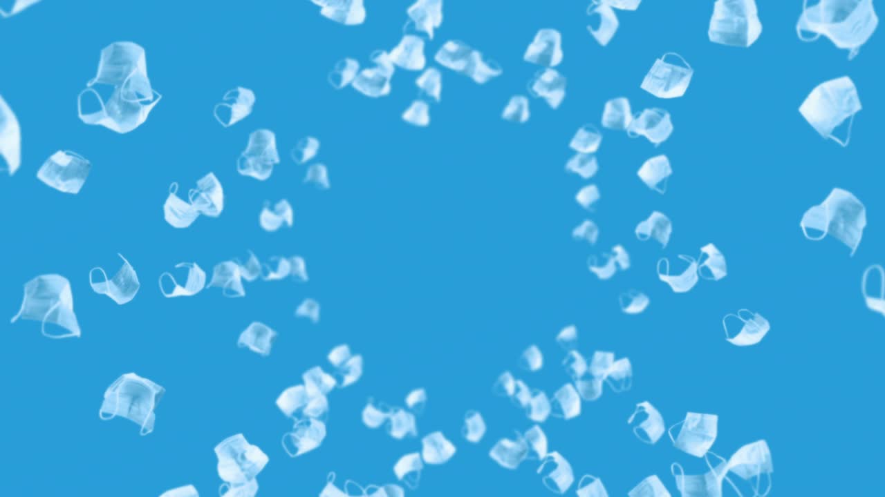 파란색 바탕에 많은 색 마스크를 날리는 의료 개념, 수술 보호 마스크, 마스크 회전의 3d 애니메이션, 루프 애니메이션.