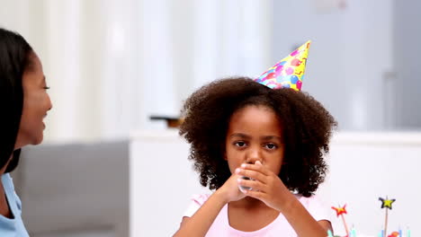 family having fun at birthday party