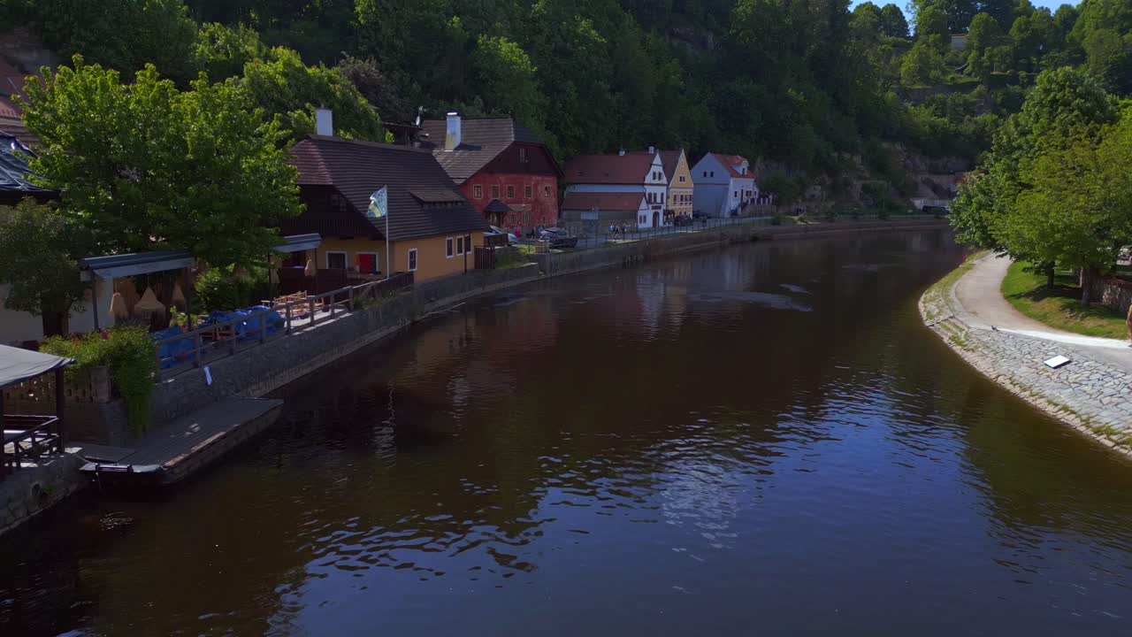 Dramatic aerial top view flight Czech Republic historical Cesky Krumlov Vltava river in summer time 2023, world heritage in Bohemia