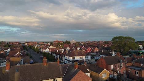 aerial panorama of a coastal town's residential area at dusk