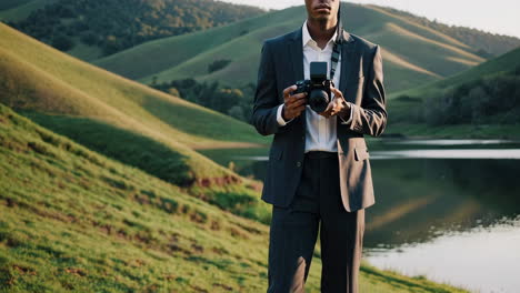 photographer in suit outdoors