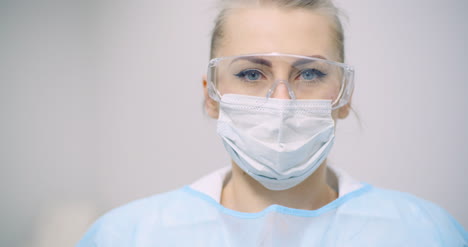 doctor measuring patient temperature at health care clinic 1