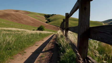 country path through rolling hills