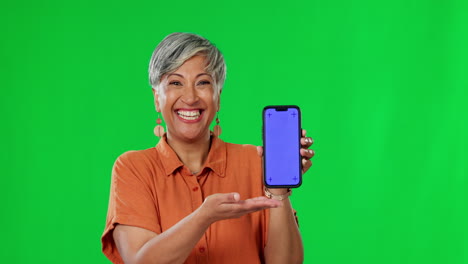 senior woman, phone and mockup on green screen