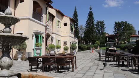 a peaceful cafe setting with moving clouds