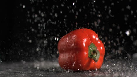 water raining on pepper in super slow motion