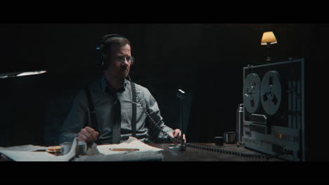 an intelligence officer listens to the wiretap recordings