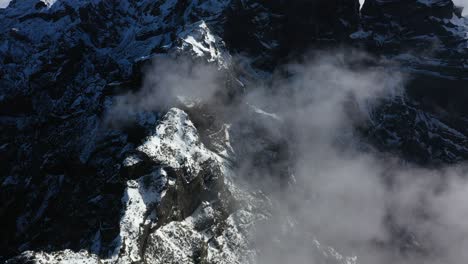 Tilt-up-drone-shot-of-the-mountain-Pico-Ruivo-in-Madeira