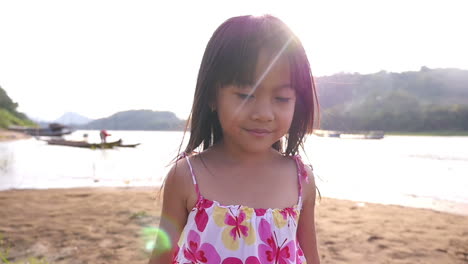 smiling girl at the riverbank