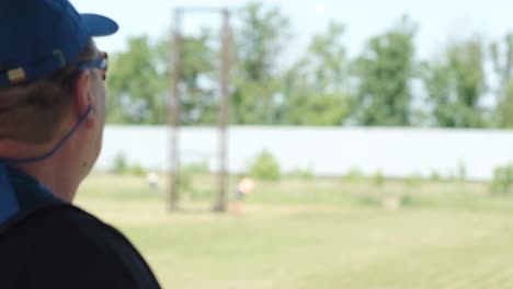 sportsman shoots from a double-barreled shotgun, a sports field for a shooting test is shooting at flying skeet