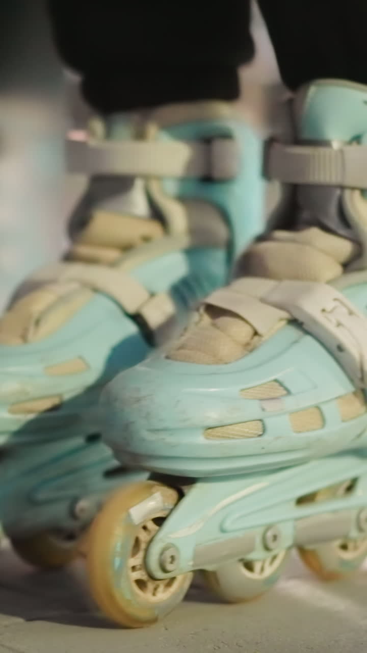 Close-up of rollerblades gently rolling in place against a nighttime background with soft, diffused lighting. the motion and detail of the skates, evoking a sense of nighttime activity,urban lifestyle