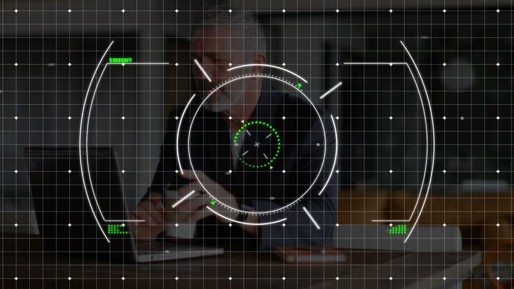 Animation of scope scanning and data over caucasian businessman using laptop