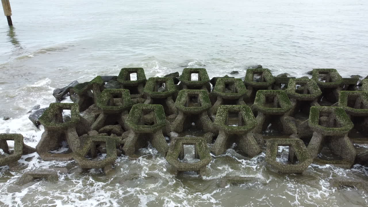 Aerial drone view of the New Brighton Beach with wave cutters