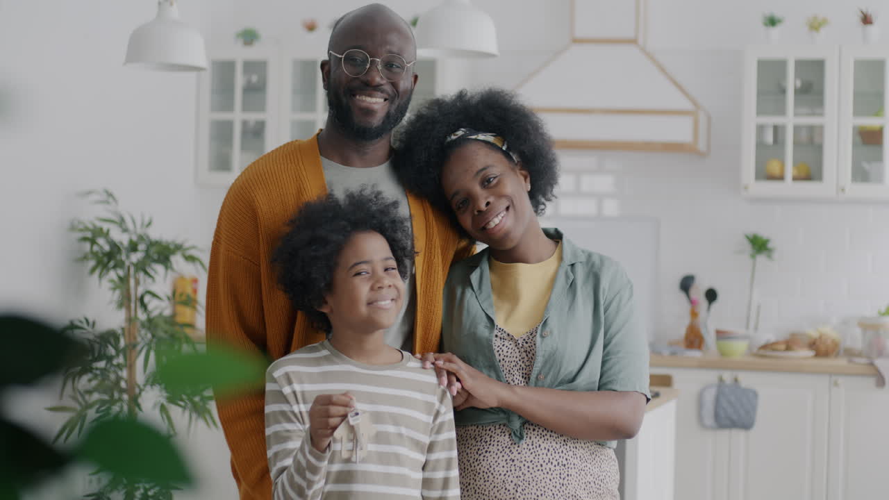 Happy Family with New House Keys