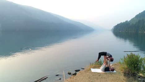 couple practice acroyoga 4k