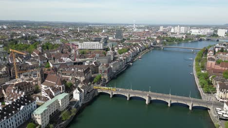 Aerial-Basel,-Switzerland-over-Rhine-River-in-European-country,-establish-shot