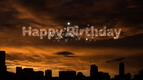 feliz cumpleaños escrito con fuegos artificiales blancos