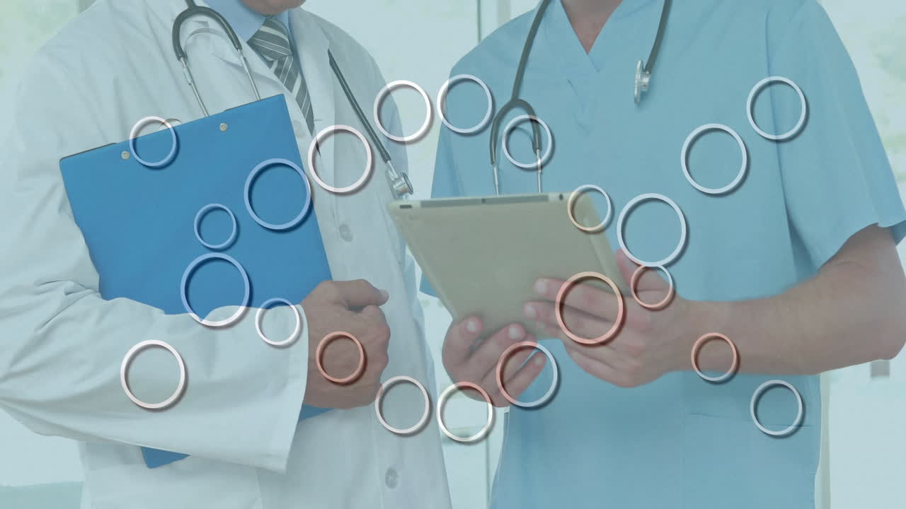 Discussing patient information, medical professionals using circular data animation