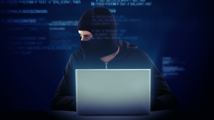 Kompositvideo af hacker, der bruger bærbar computer
