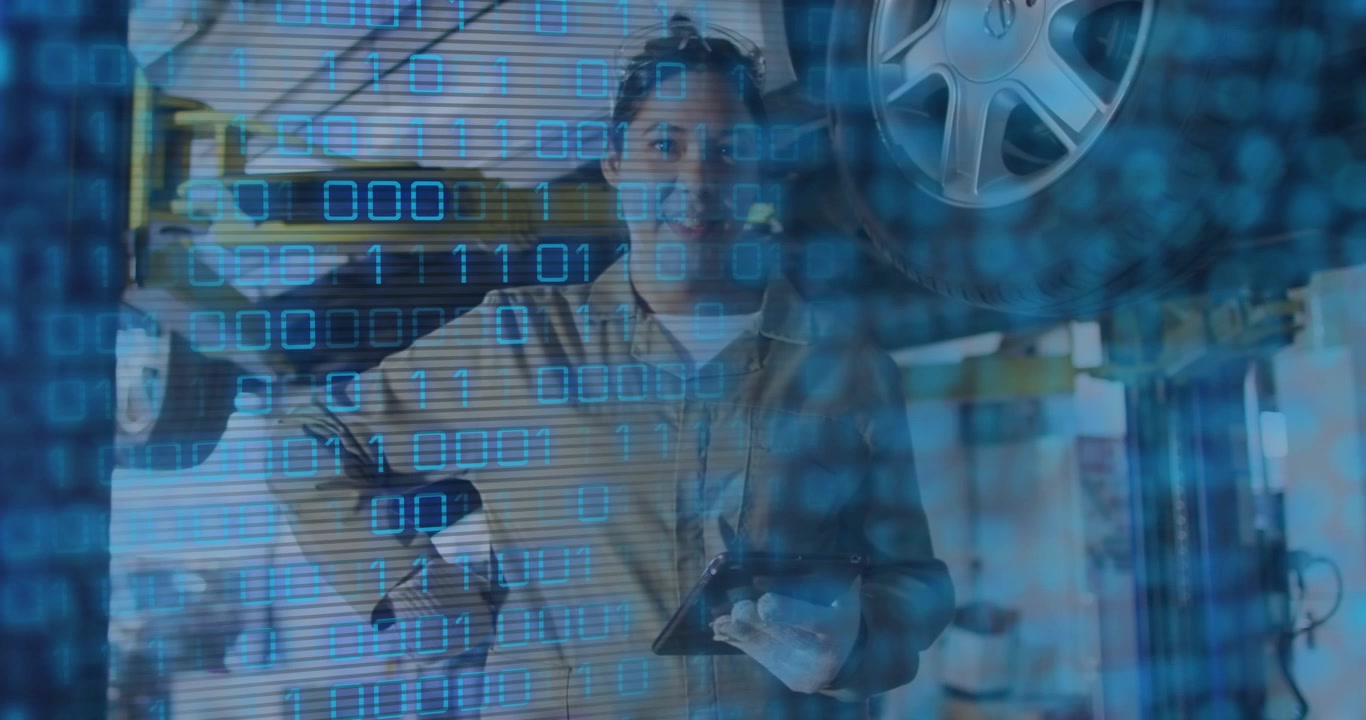 Tech tapping tablet and pointing at wheel, running diagnostics with blue binary overlay and reel
