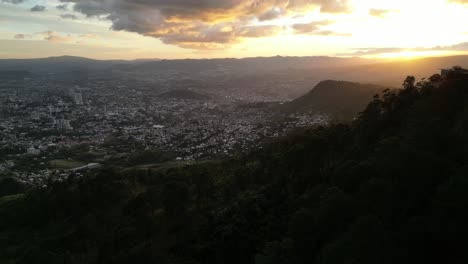 sunset in tegucigalpa, capital of honduras, aerial view, latin american poverty