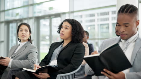 seminar, question or business people writing notes