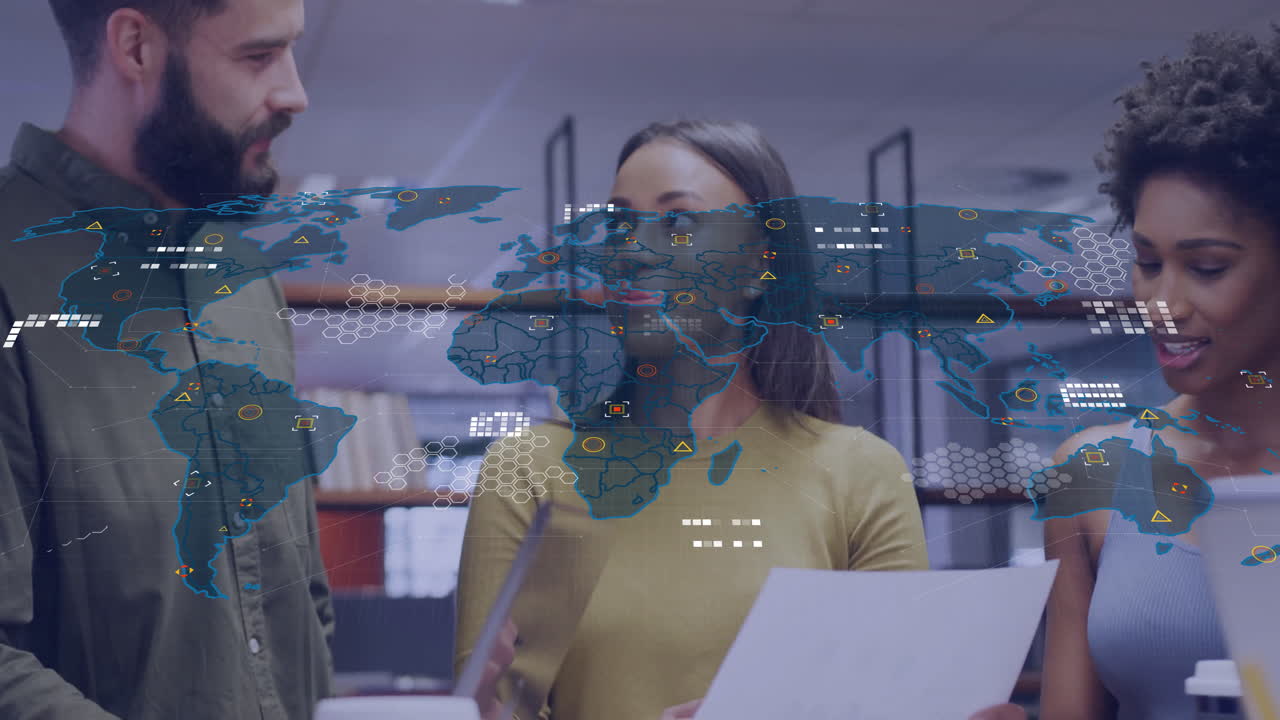 Diverse business team discussing documents with world map data overlay animation