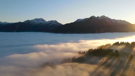 sunset and clouds over mountainous countryside