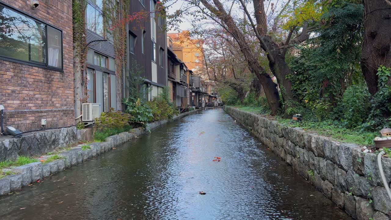 Scenic shallow Takase River flows peacefully through Kyoto Japan