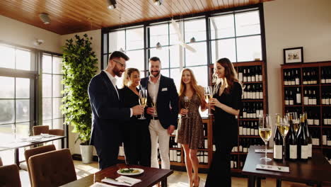 people celebrating with champagne in an elegant restaurant