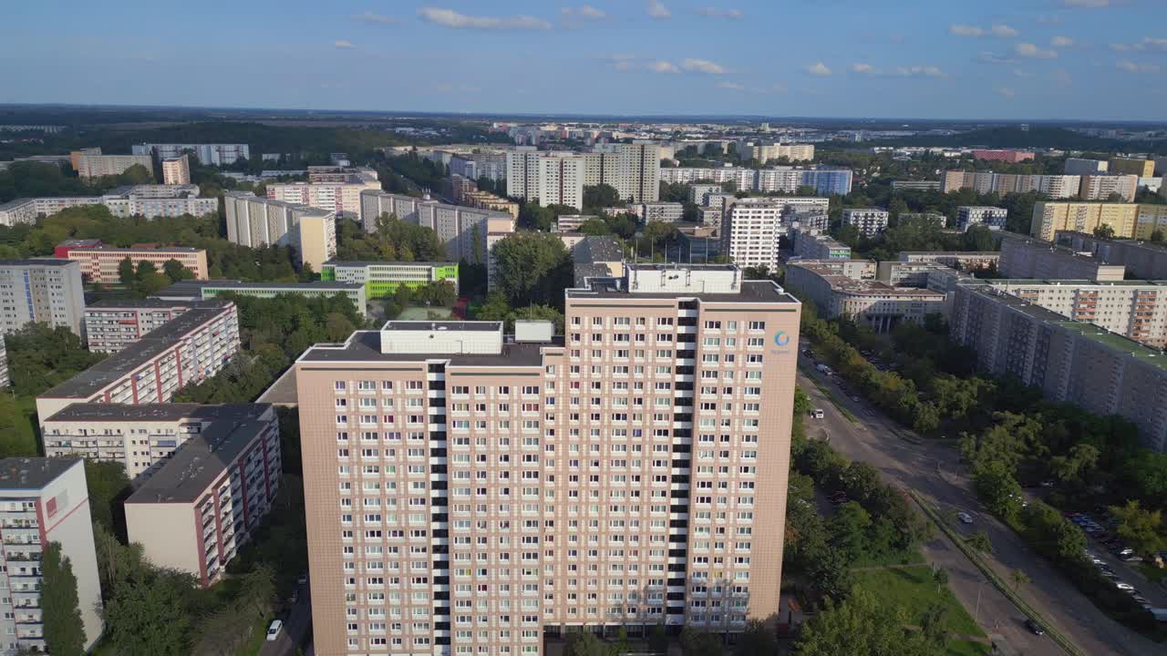 Majestic aerial top view flight Large panel system building Apartment, prefabricated housing complex, Berlin Marzahn East German summer 2023