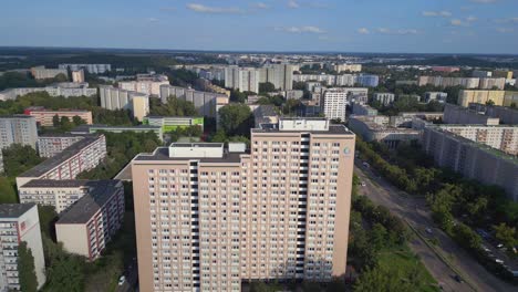 majestic aerial top view flight large panel system building apartment, prefabricated housing complex, berlin marzahn east german summer 2023