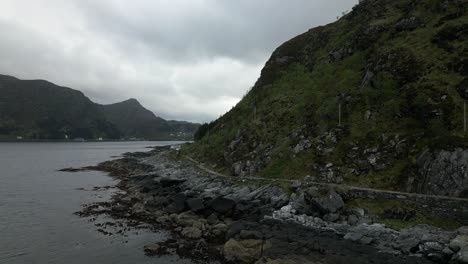 Aerial-Sideways-shot-of-Coastline-Revealing-Torskangerpollen-in-Måløy,-Norway