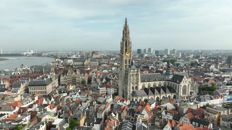 tower of cathedral of our lady, and historic old town of antwerp, belgium