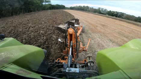 modern disc plough furrow trenching the soil of ancona countryside