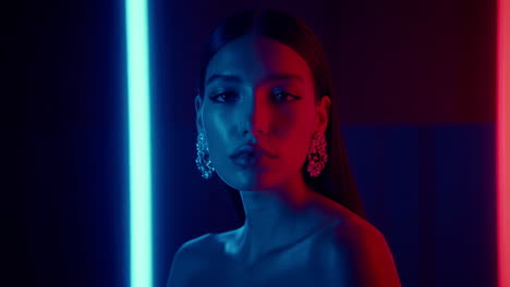 striking portrait with red and blue neon lights